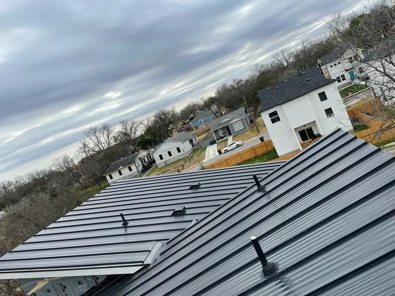 Standing seam metal roof panels with vents for Skylight Repair in Warrensburg